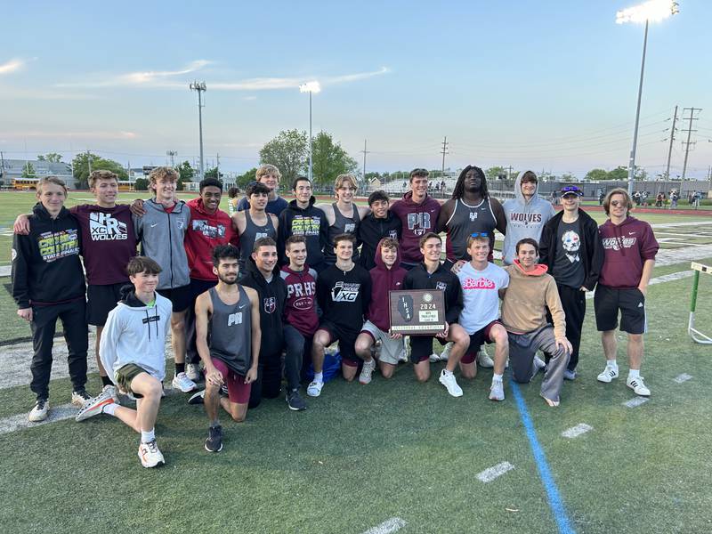 Prairie Ridge poses with its plaque after winning the Class 2A Ridgewood Sectional in Norridge on Wednesday.