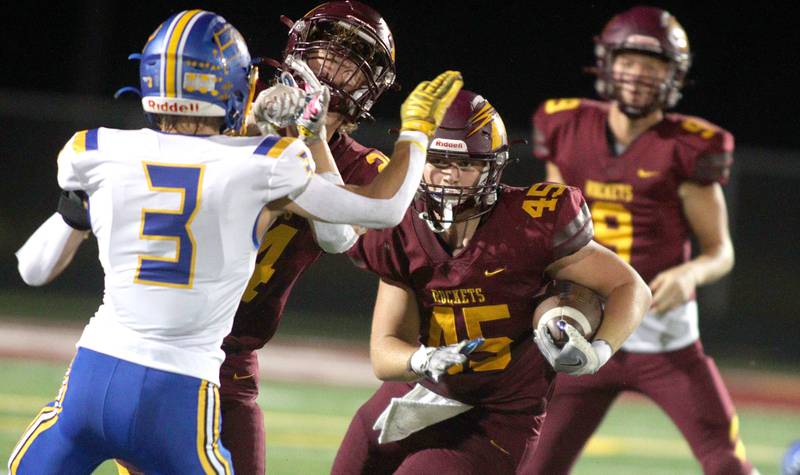 Richmond-Burton’s Riley Shea runs the ball against Johnsburg in varsity football action on Friday, Sept. 13, 2024, at Richmond-Burton High School in Richmond.