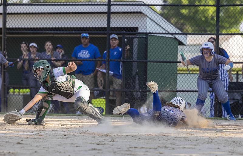 Princeton’s Makayla Hecht slides in safe with the winning run in the bottom of the 7th against Rock Falls Wednesday, May 15, 2024 a the Class 2A regional softball semifinal.