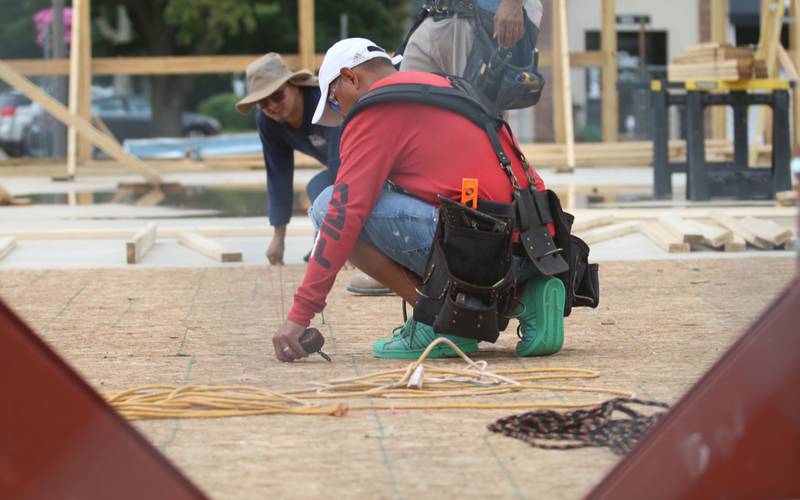 Crews chalk a line during the construction of the Second Story Teen Center on Monday, July 8, 2024  in Princeton. The 6,000 square foot building, located at 125 N. Main St. will increase the capacity for providing numerous educational, mentorship, health, nutritional and social programs for Bureau County youth in sixth through 12th grades. Second Story is funded solely on private donations and the building committee is seeking financial and in-kind donations to invest in the future of the youth of Bureau County and their communities.