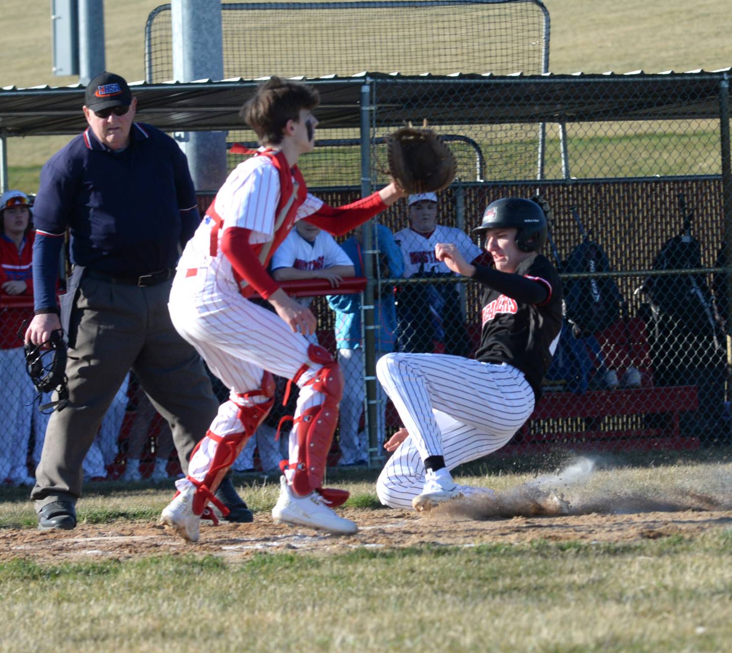 Fulton's Landon Leu slides home safely against Morrison during a Friday, March 15. 2024 game at the Morrison Sports Complex.