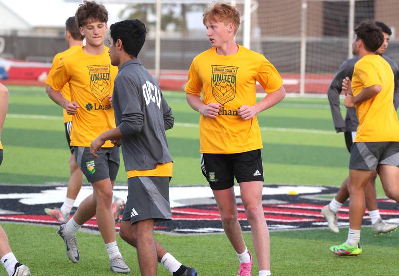 DeKalb County United players get warmed up during practice Thursday, June 6, 2024, at the Northern Illinois University Soccer and Track and Field Complex in DeKalb.