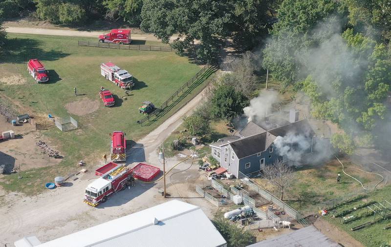 Smoke billows from a home in the 1300 block of 2500 East Street on Tuesday, Sept. 17, 2024 in rural Princeton Fire departments from eastern Bureau County were called to the scene just before 9:30a.m.