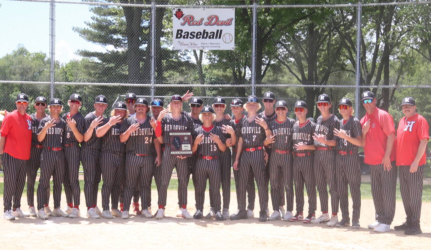 Members of the Hall baseball team pose with the Class 2A Regional title plaque after defeating Chillicothe on Saturday, May 28, 2024 at Kirby Park in Spring Valley.