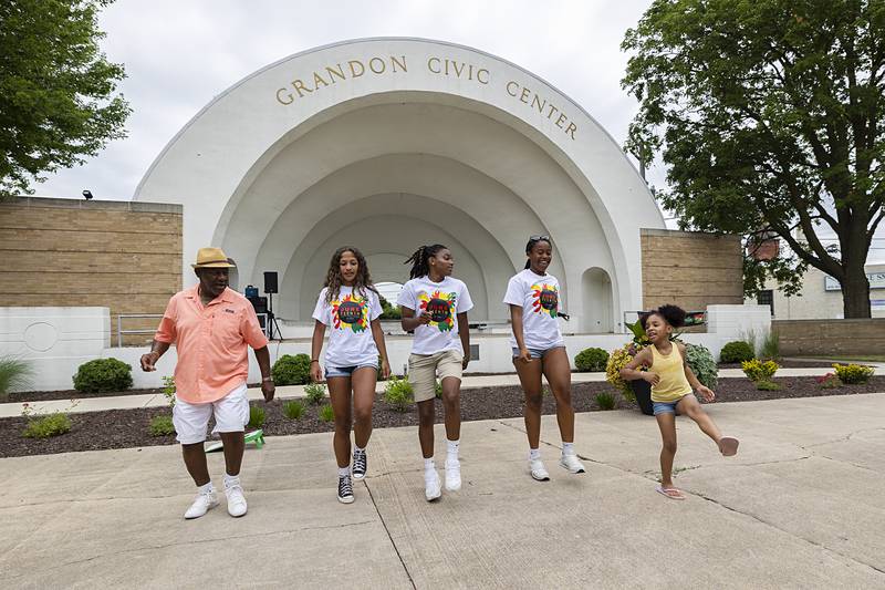 Gordon Harris Sr., Janelle Colley, Joslyn Green, Taah Liberty and Emrie Crain dance Saturday, June 22, 2024, during a Juneteenth celebration in Sterling.