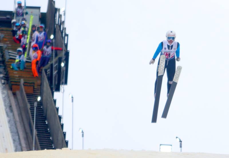 Tony Benzie of the Flying Eagles Ski Club launches during the 119th Norge Annual Winter Ski Jump Tournament in Fox River Grove Sunday.