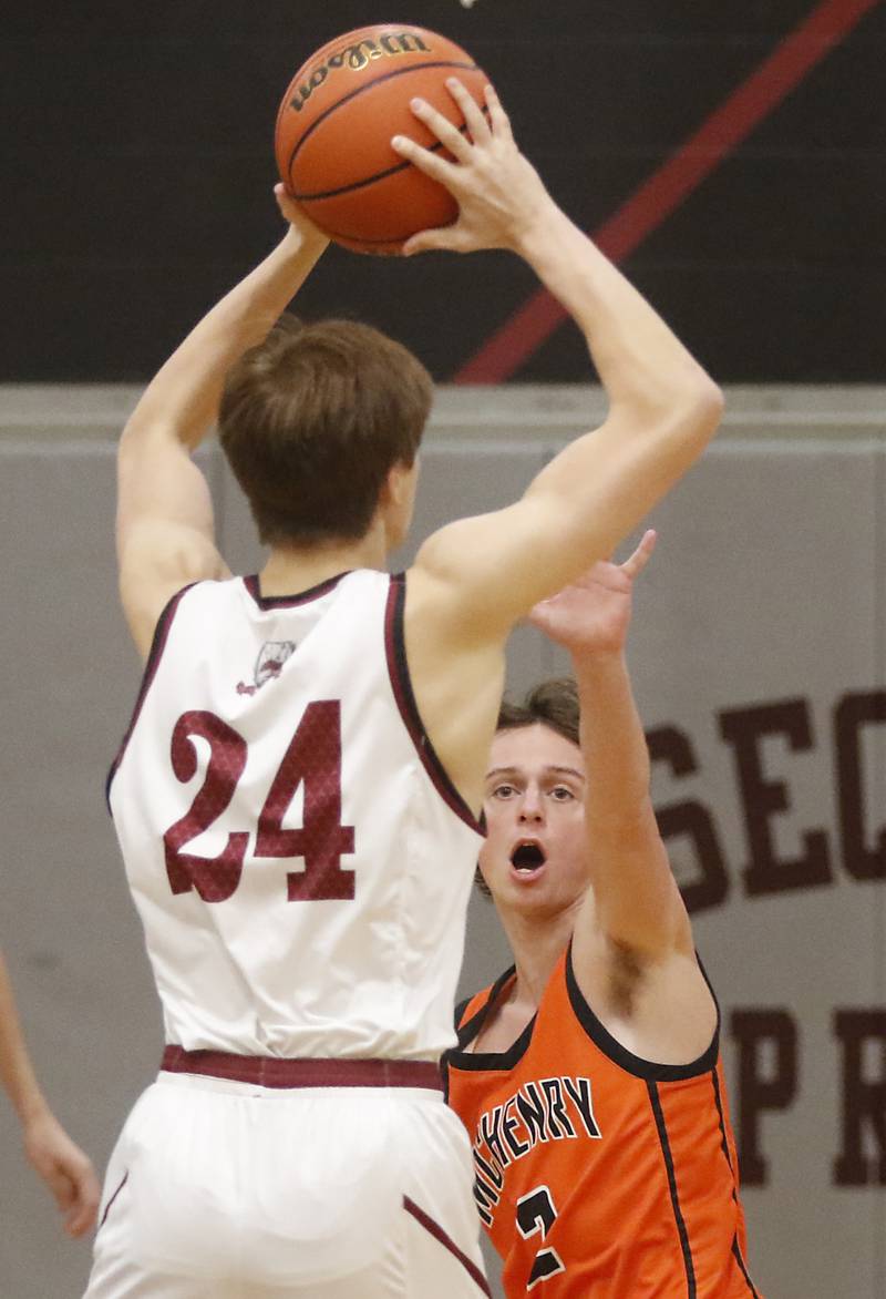 McHenry's Tyler Hurckes pressures Antioch’s Joel Bulka during a nonconference basketball game Thursday, Jan. 4. 2024, at Antioch High School.