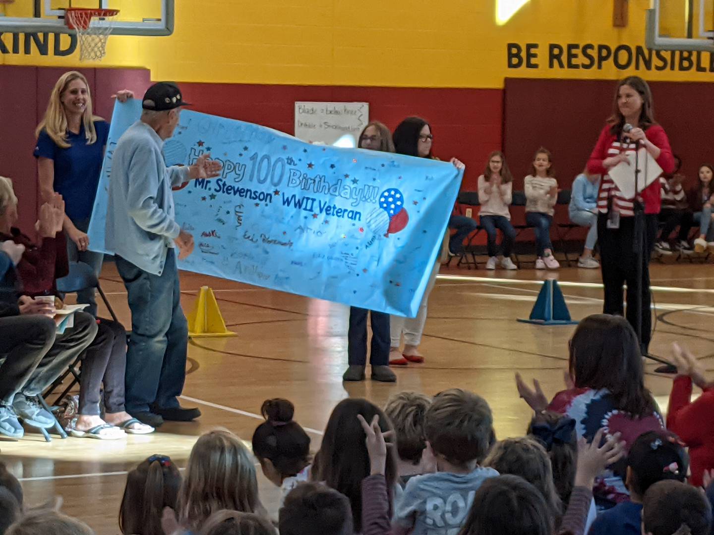 Students at Prairie Point Elementary School in Oswego on Nov. 10 helped celebrate the 100th birthday of World War II veteran Duane Stevenson. He will turn 100 on Veterans Day.