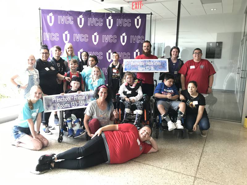 Camp Kindness attendees gather for a group photo after spending time on team building, civic mindedness and character building in the community with students from the Lighted Way joining the campers at Illinois Valley Community College.