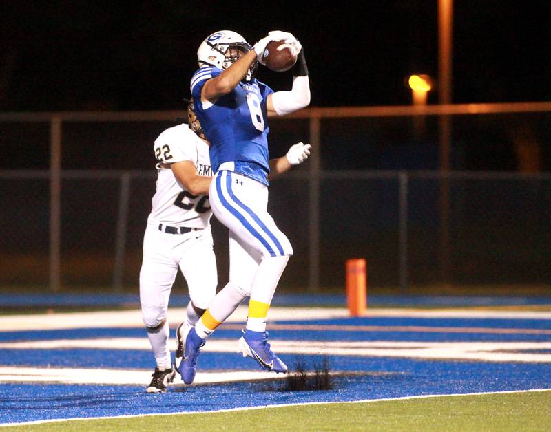 Geneva’s Finnegan Weppner catches the ball in the endzone for a touchdown during a game against Lemont Friday, Sept. 6, 2024 at Geneva.