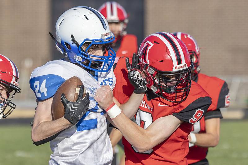 Blue Ridge’s Cole Pemble fights off Amboy’s Brody Christoffersen in a first round playoff game Saturday, Oct. 29, 2022.