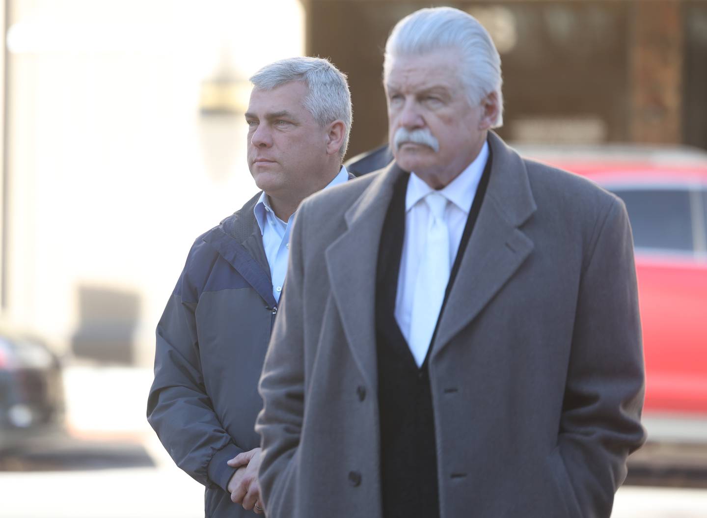 Joliet Mayor Bob O’Dekirk, back left, and Will County State’s Attorney James Glasgow attend a rally for ZONTA Says No To Violence Against Women outside the old court house on Tuesday in Joliet.