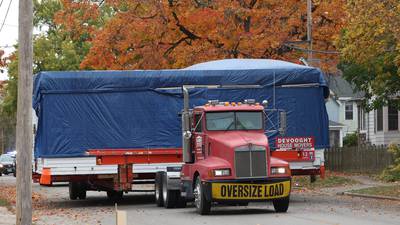 Photos: Unusual sight as house on tractor trailer driven through Sycamore, DeKalb