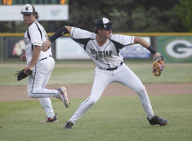 Sycamore’s Kyle Prebil fires to first for an out against Morris Monday, June 3, 2024 in the Class 3A Geneseo supersectional.