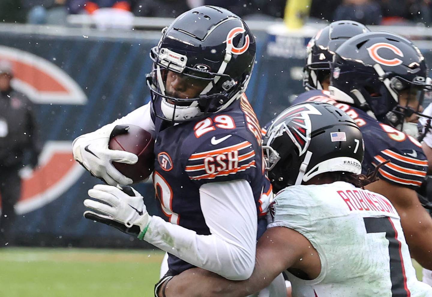 Chicago Bears cornerback Tyrique Stevenson intercepts a pass intended for Atlanta Falcons running back Bijan Robinson during their game Sunday, Dec. 31, 2023, at Soldier Field in Chicago.