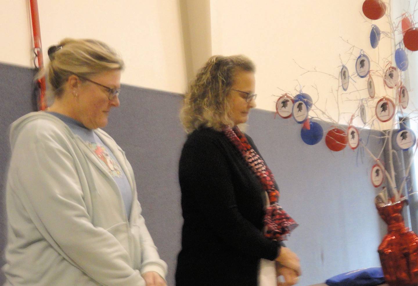 Fort du Rocher Chaplain Alice Giberson (right) inducts new members Susan Scully and Melinda Jaht.