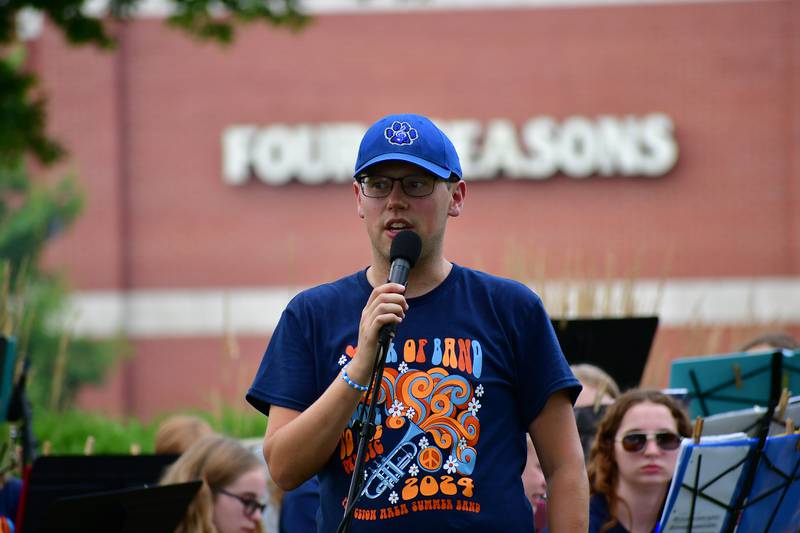 After the opening number, Steve Olson gives some background information about the youth band Sunday, July 14, 2024, in Princeton.