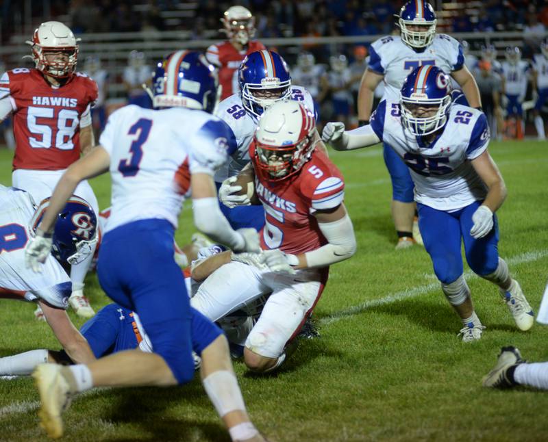 Oregon's Hunter Bartel (5) runs for yards against Genoa-Kingston on Friday, Sept. 13, 2024 at Landers-Loomis Field in Oregon.