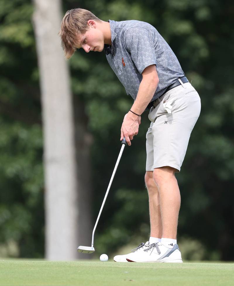 DeKalb’s Tyler Brackemyer putts on the third green Monday, Sept. 16, 2024, during the Mark Rolfing Cup at the Kishwaukee Country Club in DeKalb.