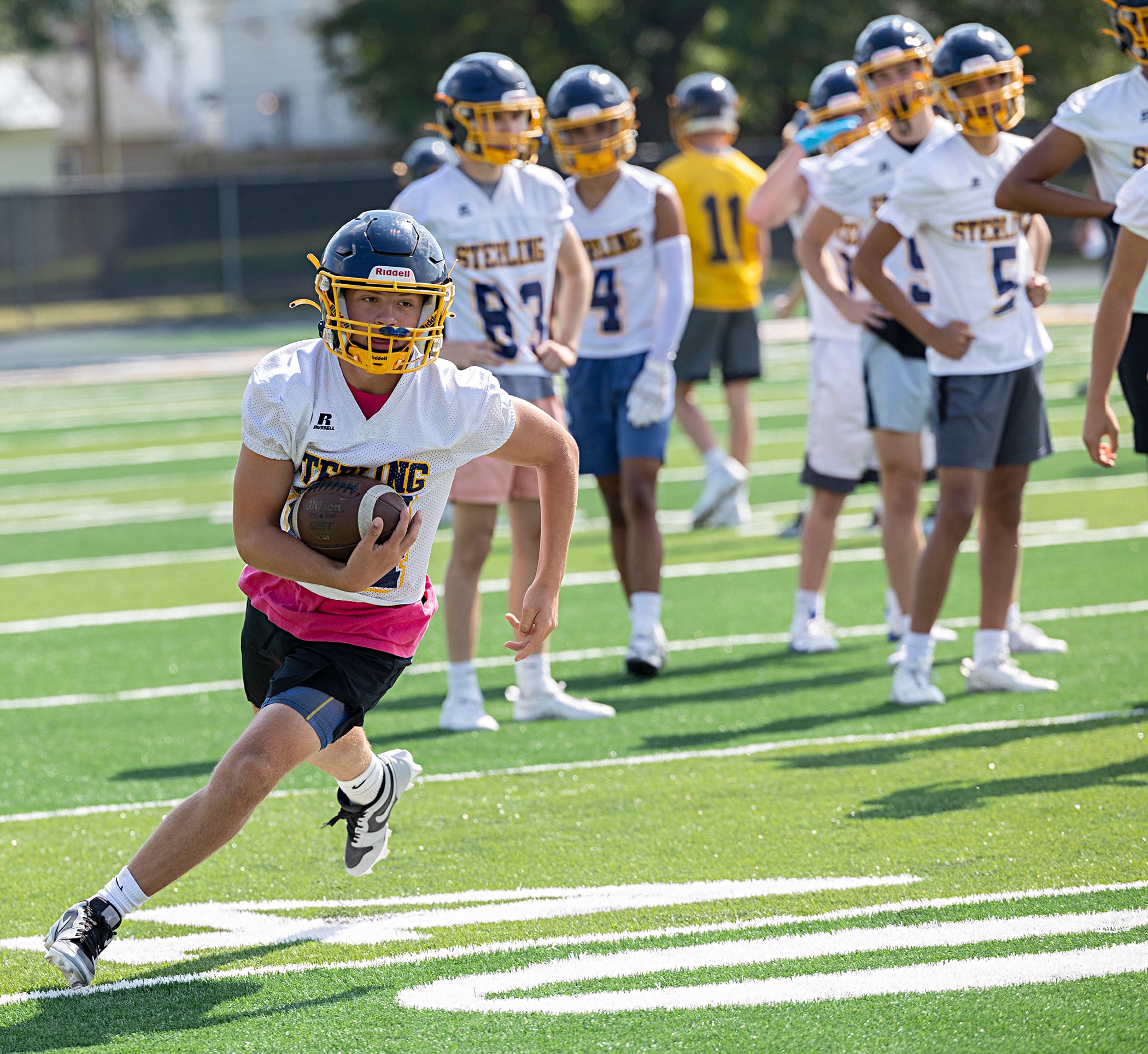 Sterling’s Cobey Shipma runs upfield Tuesday, Aug. 13, 2024 during first week practice.