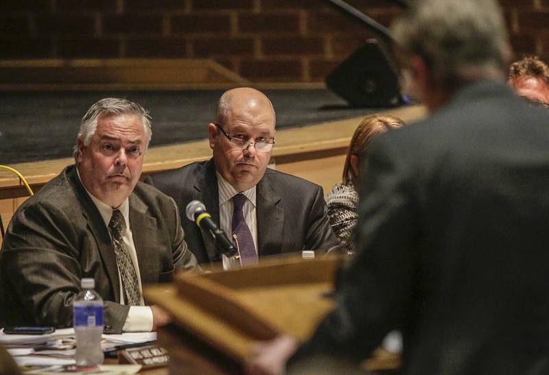 Lincoln-Way Community High School District 210 Board of Education President Kevin Molloy and Superintendent Scott Tingley listen to comment Thursday during a board meeting at Lincoln-Way Central High School in New Lenox.