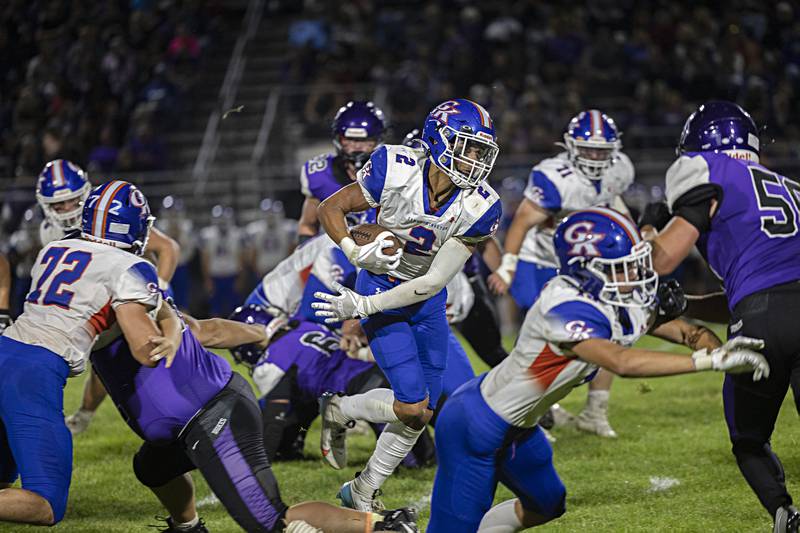 Genoa-Kingston’s Tyler Atterberry looks for running room Thursday, Sept. 14, 2023 in a game at Dixon High School.