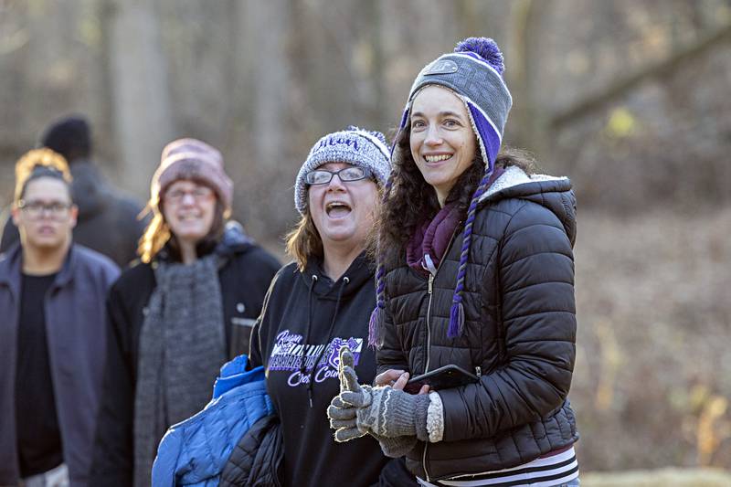 Renae Higley (left) and Angela Haws cheer on the runners Thursday, Nov. 23, 2023 of Turkey Trot.