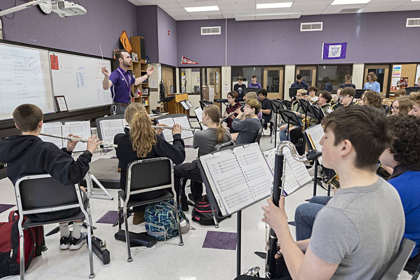 Dixon High School band director Riley Carter conducts his band Tuesday, April 11, 2023. Carter and company are practicing for the upcoming music contests.