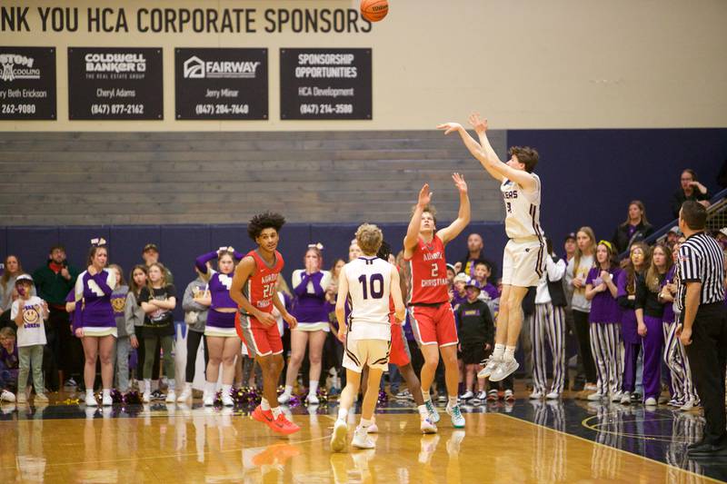 Serena's Hunter Staton shoots a three pointer against Aurora Christian at the Class 1A Boy's Basketball  Super Sectional on Friday , March 1, 2024 at Harvest Christian Academy  in Elgin.