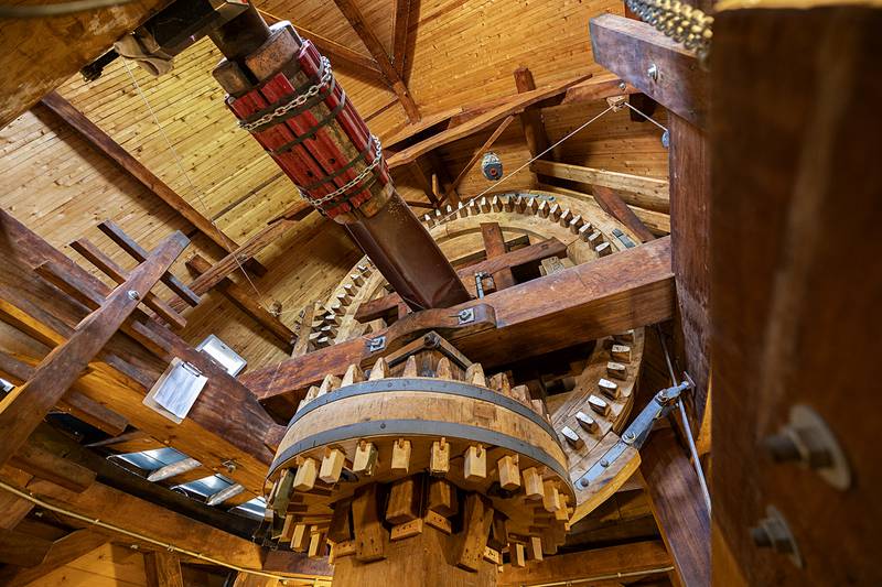 Cogs and gears are seen inside of the Fulton windmill Friday, June 7, 2024.