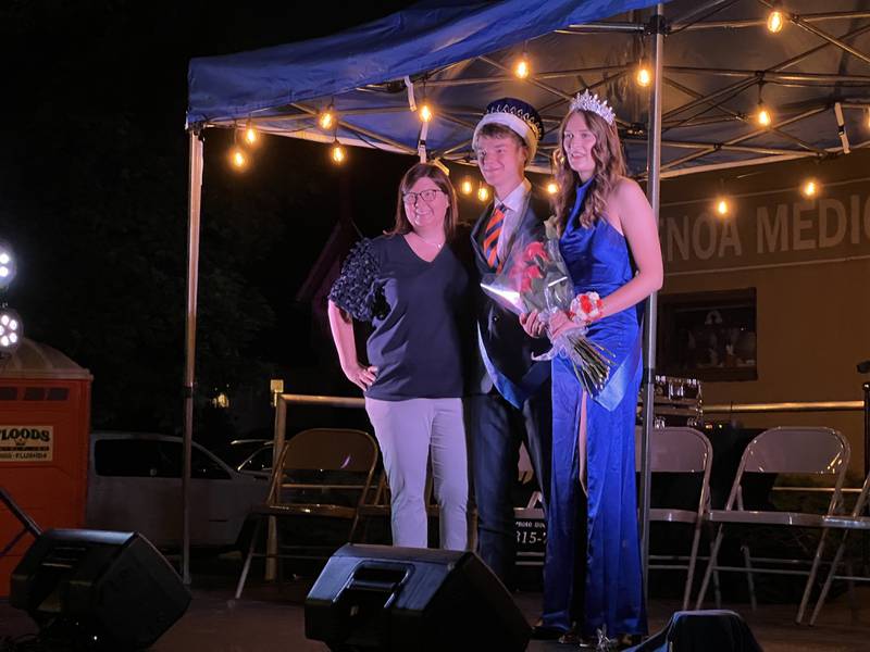 Genoa Area Chamber of Commerce Krissy Johnson stands with Genoa Days 2024 King and Queen scholarship contest winners Connor Leahy and Rylie Stoffregen on June 5, 2024.