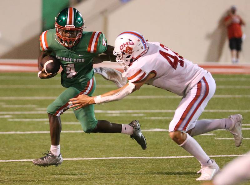 L-P's Cordell Wheatley gets outside of Ottawa's Joey Liebhart on Friday, Sept. 13, 2024 at Howard Fellows Stadium.