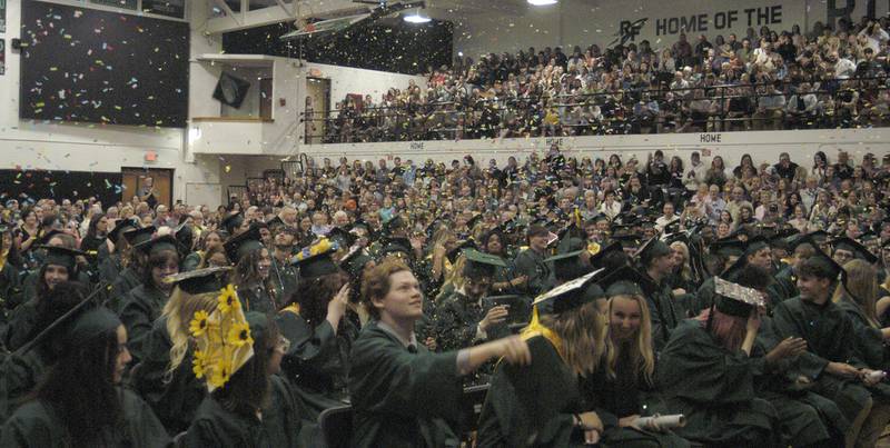 Confetti covers Rock Falls graduates Sunday, May 26, 2024, at Rock Falls High School.