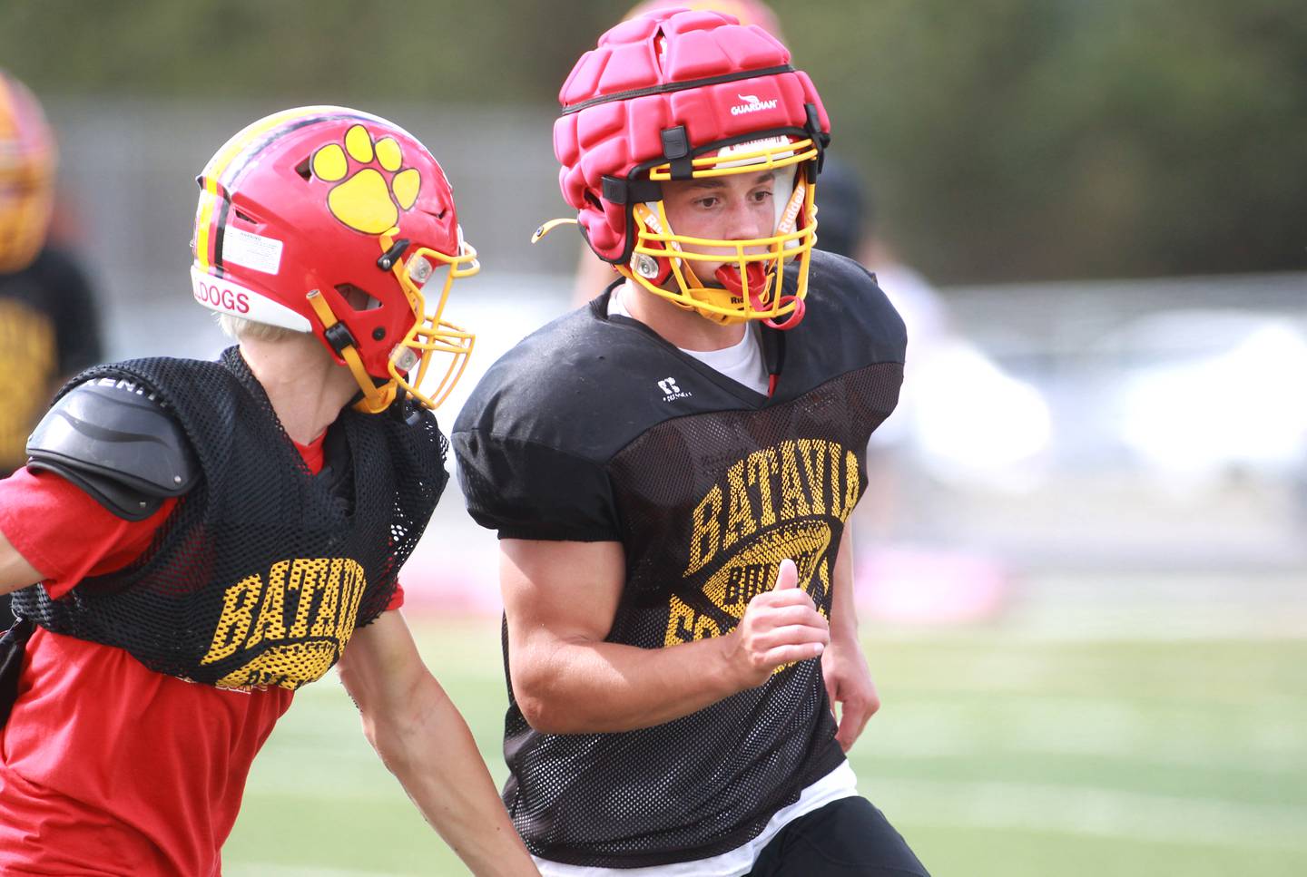 Batavia’s Chase Osborne (left) runs drills with the defense during a practice on Wednesday, Aug. 28, 2024 at the school.