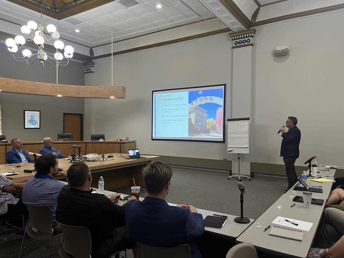 Josh Koonce, practice lead at Houseal Lavigne, explains how the city will use the comprehensive plan for the next two decades at a plan commission meeting on Tuesday.