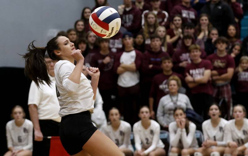 Prairie Ridge's Maizy Agnello watches the ball. Heads out of play during the Class 3A Woodstock North Sectional finals volleyball match on Wednesday, Nov. 1, 2023, at Woodstock North High School.