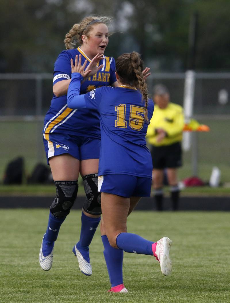 Johnsburg's Mackenzie McQuiston celebrates with her teammate, Lauren McQuiston, after McQuiston scored a goal during the IHSA Class 1A Marengo Regional championship soccer match on Tuesday, May 14, 2024, at Marengo High School.