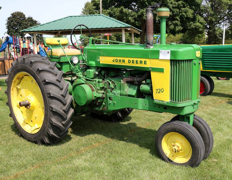 A 1958 John Deere 720 on display Saturday, July 15, 2023, at the Waterman Lions Summerfest and Antique Tractor and Truck Show at Waterman Lions Club Park.