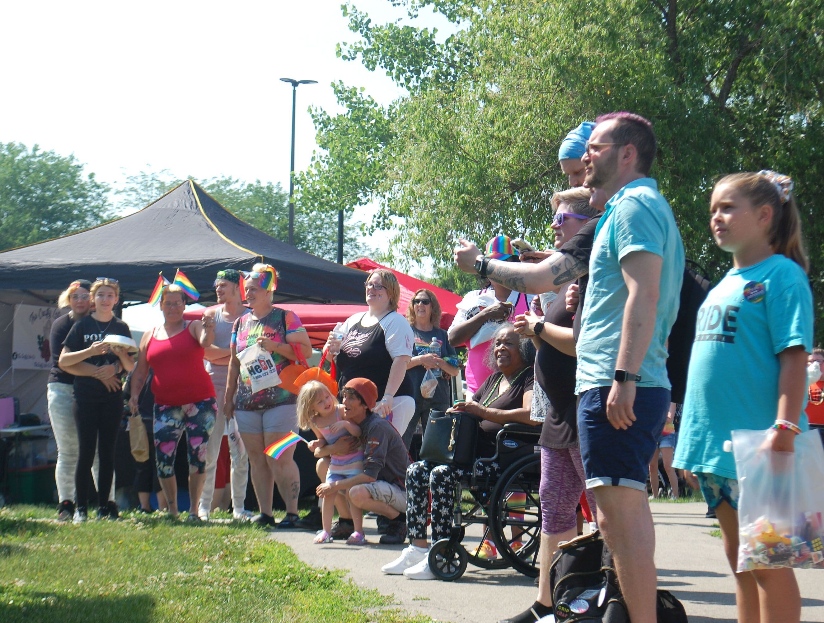 Spectators watch the Ottawa Family Pride Festival lip sync battle at the Jordan block in downtown Ottawa on Saturday, June 10, 2023.