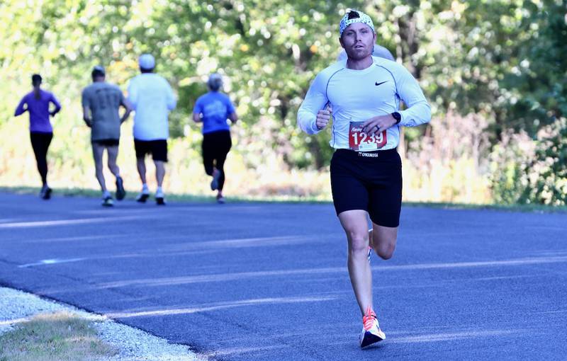 Zach Johnson of Geneseo heads the field in Saturday's Bureau County Homestead 5K race. He won the raced with a time of 17:45.4.