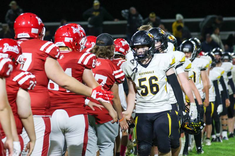 Players of Riverdale congratulate players of Hall after loss on Friday, October 18, 2024 at Richard Nesti Stadium in Spring Valley.