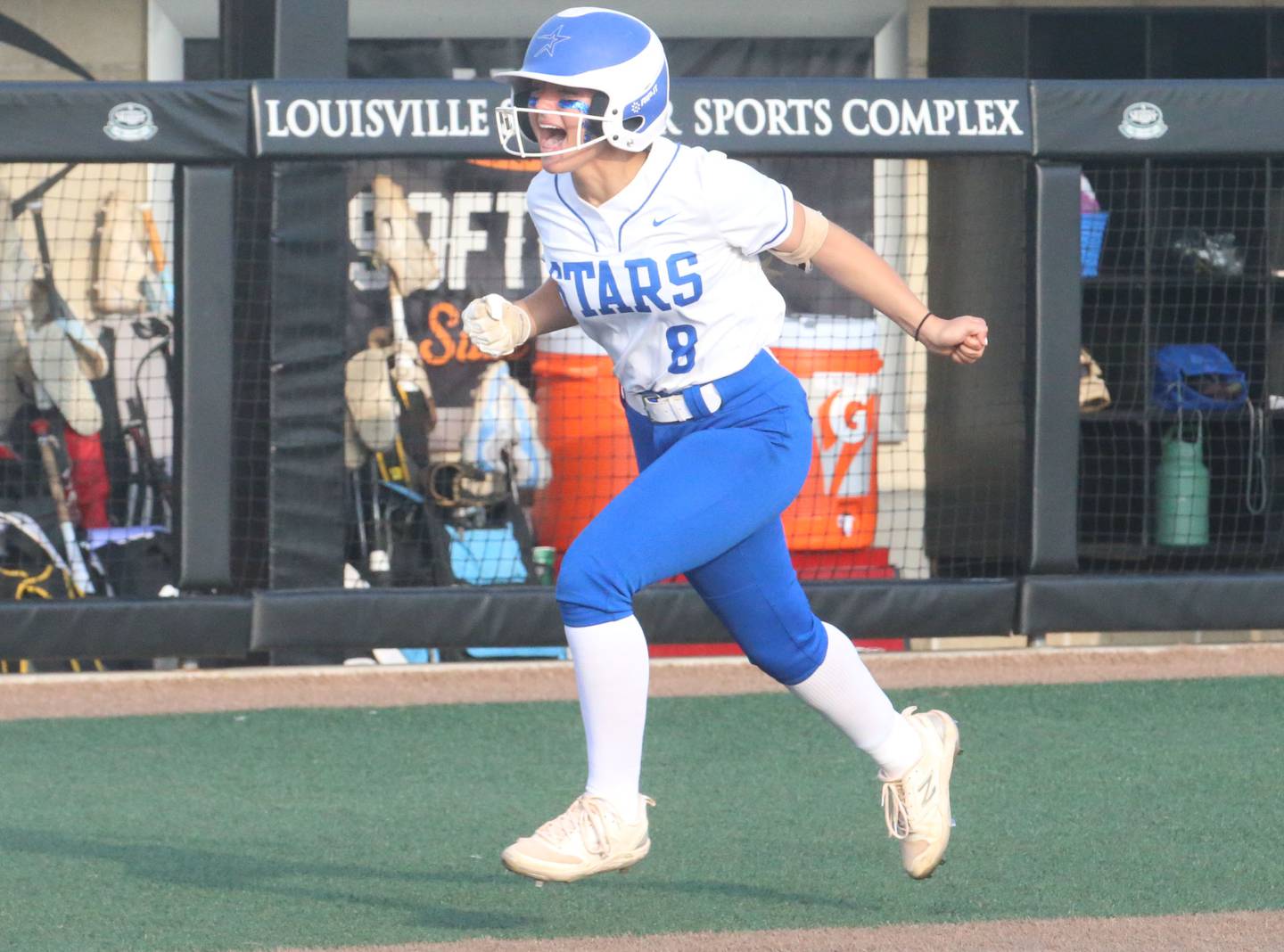 St. Charles North's Ginger Ritter reacts while running to home plate after hitting a home run against Marist during the Class 4A championship game on Saturday, June 8, 2024 at the Louisville Slugger Sports Complex in Peoria.