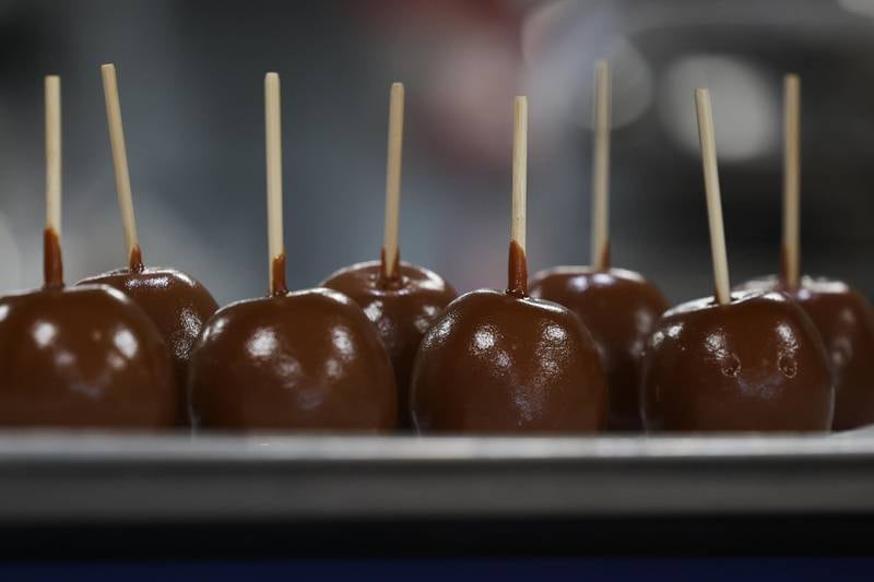 A fresh batch of candy apples wait to be wrapped at Candy and Corn on Wednesday, August 28, 2024 in Plainfield.