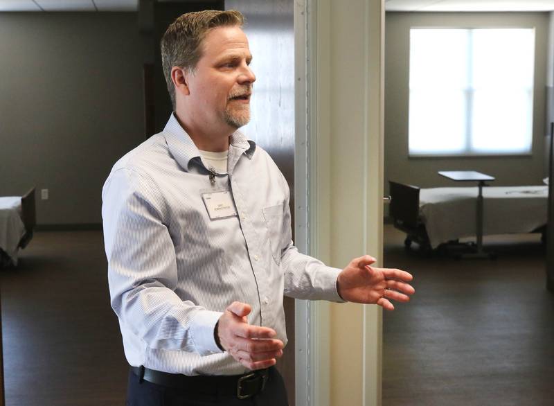 Bart Becker, administrator of the DeKalb County Rehabilitation and Nursing Center, talks Wednesday, July 10, 2024, about some of the features in the centers new transitional care wing. The new addition recently opened and residents have begun moving in.