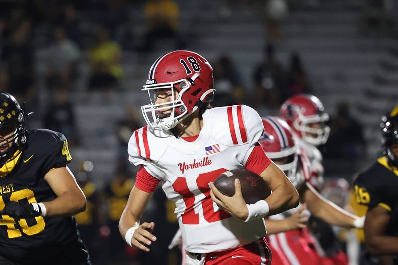 Yorkville’s Luke Zook rushes to the outside against Joliet West on Friday, Sept. 13, 2024 in Joliet.