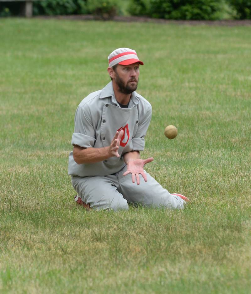 Ganymede Brett "Shifty" Rogers (left) fields the ball during a vintage base ball game against the DuPage Plowboys at the John Deere Historic Site in Grand Detour on Saturday, June 8, 2024.