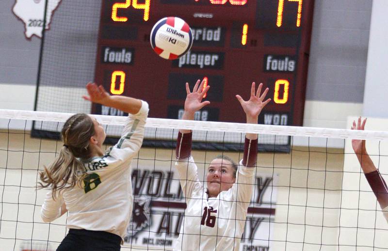 Prairie Ridge’s Adeline Grider, center, prepares to block Crystal Lake South’s Bobbi Wire in varsity girls volleyball on Thursday, Aug. 29, 2024, at Prairie Ridge High School in Crystal Lake.