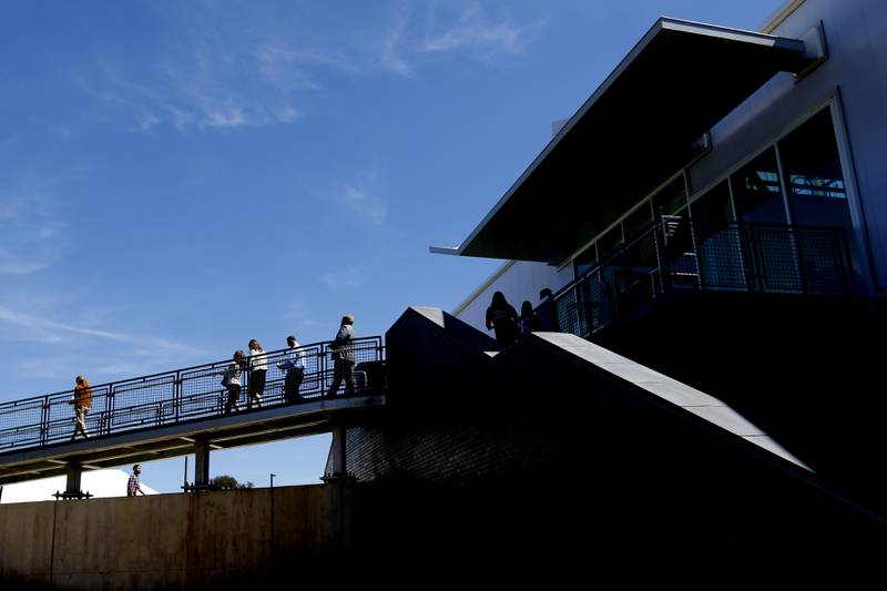 People outside the Foglia Center for Advanced Technology and Innovation on Tuesday, Sept. 3, 2024, at McHenry County College.