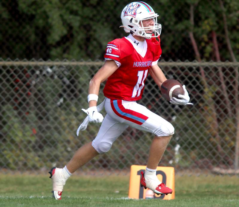 Marian Central’s Maxwell Kinney glides into the end zone with a touchdown against Bishop McNamara in varsity football action on Saturday, Sept. 14, 2024, at George Harding Field on the campus of Marian Central High School in Woodstock.