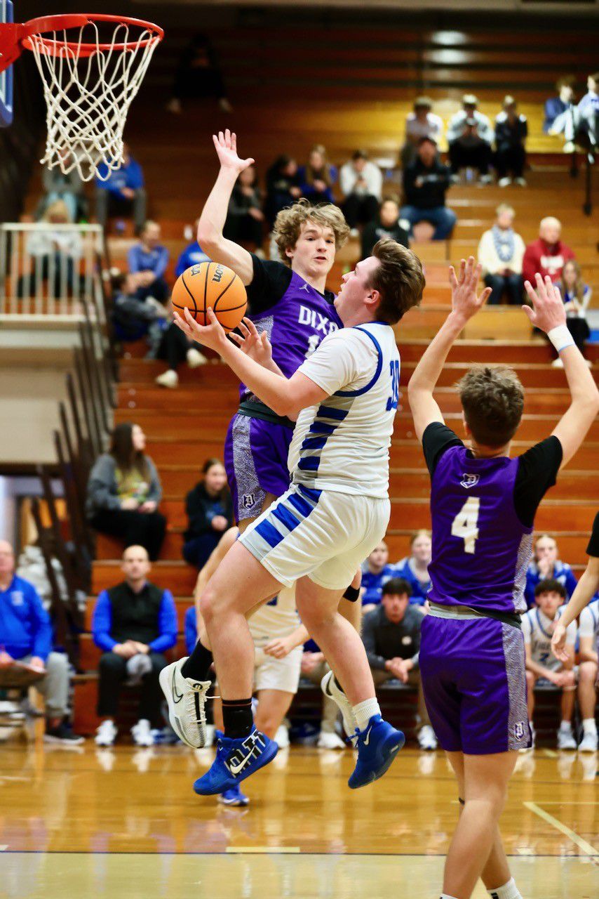 Princeton's Jordan Reinhardt drives on Dixon Monday night at Prouty Gym. The Dukes won 61-50.